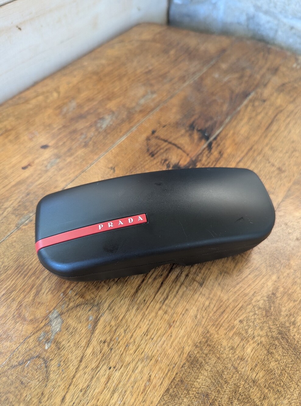 Prada Plastic Matte Black Sunglasses Case with Red Stripe